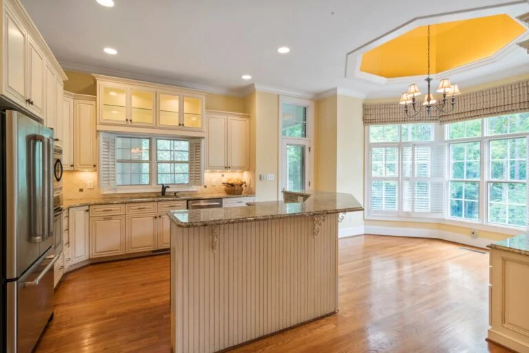 Kitchen with island and bay windows