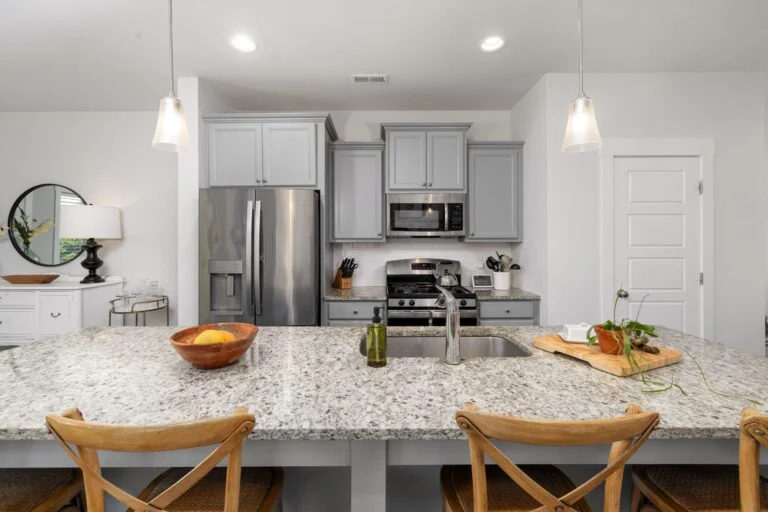 White kitchen with island seating